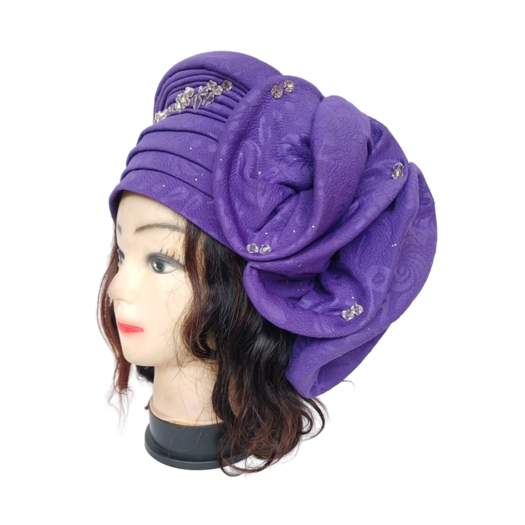Turban violet avec perle et grosse fleur