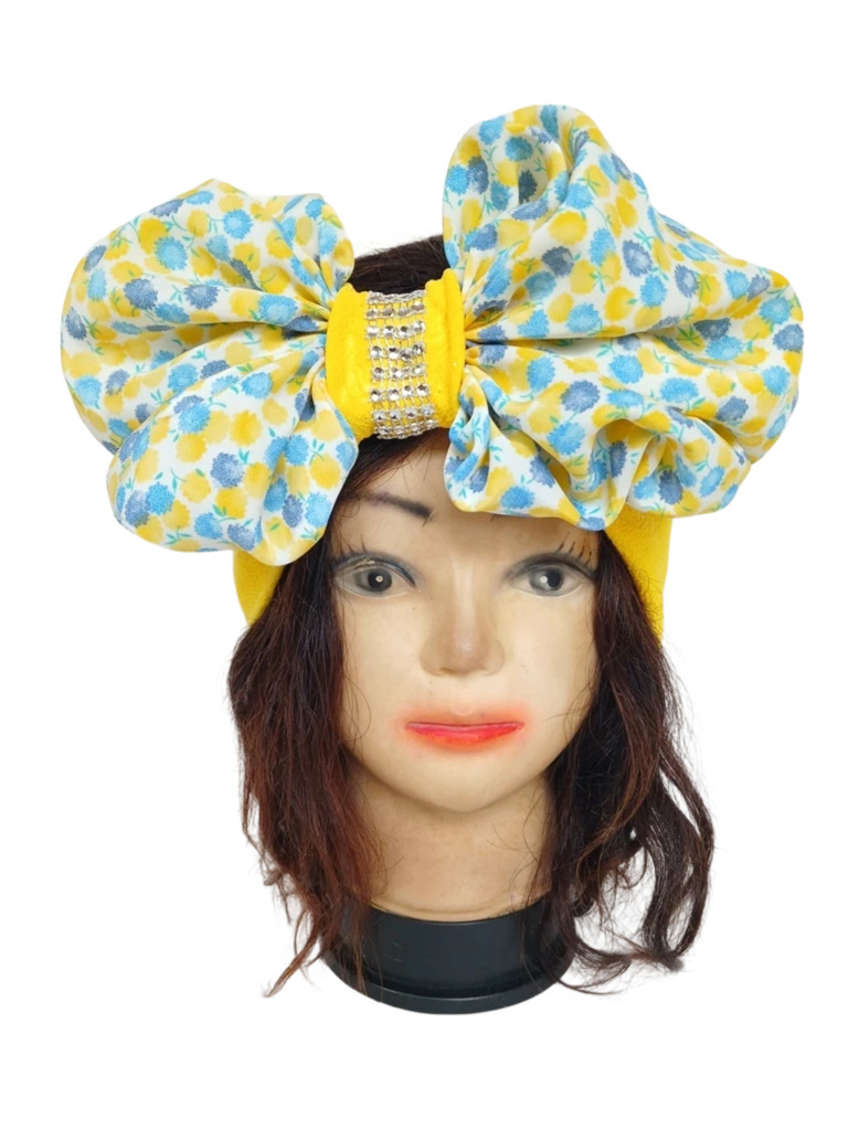 Bandeau jaune avec noeud fleuri